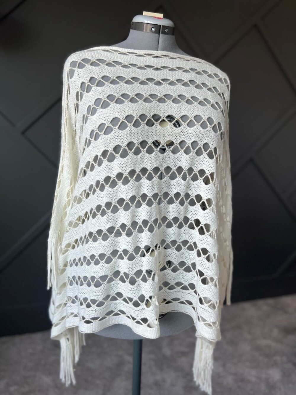 Soft knit poncho in cream